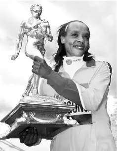  ??  ?? Winner of the elite women’s race, Kenya’s Jemima Sumgong poses with the trophy during the Virgin Money London Marathon at The Tower Hotel in St Katharine’s Way, London in this April 25, 2016 file photo.