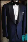  ?? Special to the Democrat-Gazette/ PAUL RAINWATER ?? This tuxedo from Q Clothier will help take that formal Valentine’s date night up more than just a notch.