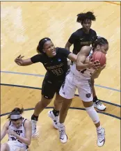  ?? MICHAEL THOMAS — THE ASSOCIATED PRESS ?? Missouri State guard Brice Calip, right, fights for a rebound with Wright State Forward Shamarre Hale during the second quarter of their NCAA Tournament game in San Antonio on Wednesday.