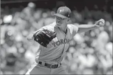  ?? FRANK FRANKLIN II/AP PHOTO ?? Toronto Blue Jays pitcher Clayton Richard delivers during the first inning of Saturday’s game against the New York Yankees at New York.