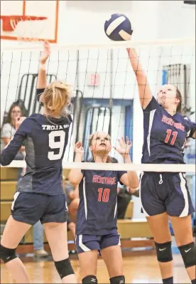  ??  ?? Heritage’s Haylee Brownsey tries to put a shot past Gordon Lee’s Reagan Yancey, while Georgia Taylor of the Lady Generals looks on. Results of the match had not been provided as of press time.