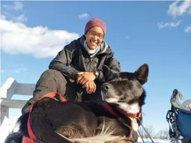  ?? Photograph: Courtesy of Emily Ford ?? Emily Ford, 28, on the Ice Age trail with Diggins, her Alaskan husky.