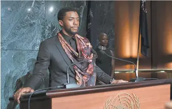  ?? MARVEL STUDIOS ?? King T’Challa ( Chadwick Boseman) has an important announceme­nt for the United Nations in “Black Panther.”