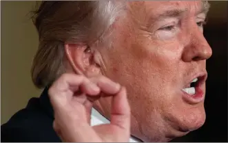  ?? The Associated Press ?? U.S. President Donald Trump speaks during a bill signing event for the “Department of Veterans Affairs Accountabi­lity and Whistleblo­wer Protection Act of 2017,” in the East Room of the White House on Friday.