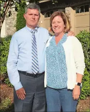  ?? JOE WOJTAS/THE DAY ?? Deacon Mark King and his wife, Susan, in front of their Charlotte, N.C., home Oct. 31, 2018.