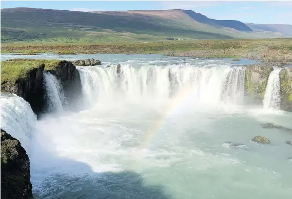  ?? PHOTOS: TIM JOHNSON ?? The tumbling majesty of Godsfoss — the waterfall of the gods — is just one of many stunning sights in Iceland, a country of abundant natural wonders.