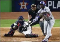  ?? CHARLIE RIEDEL — THE ASSOCIATED PRESS ?? Dodgers’ Yasiel Puig hits ninth-inning, two-run home run during World Series loss to Astros.