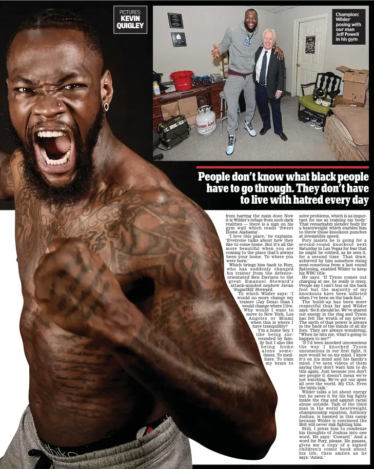  ??  ?? Champion: Wilder posing with our man Jeff Powell in his gym