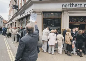  ??  ?? Queues outside a former Northern Rock branch.