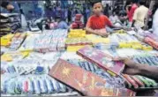  ?? ARUN SHARMA/HT ?? People buy crackers in Old Delhi on Thursday.