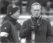  ?? Matt Ludtke Associated Press ?? JOE BUCK, talking to Seattle’s Pete Carroll, is moving from Fox to ESPN’s “Monday Night Football.”