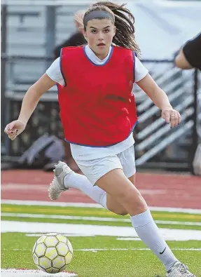  ?? STAFF PHOTOS BY MATT STONE ?? SHOOTING STAR: Lauren Bonavita recently set the school record for goals at Whitman-Hanson, and hopes to lead the Panthers to another Division 1 South title before heading off to UMass next season.