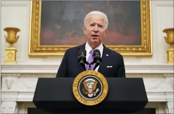  ?? ALEX BRANDON — THE ASSOCIATED PRESS ?? President Joe Biden on Thursday signed executive orders to fight the coronaviru­s outbreak. Face masks will be required for travel.