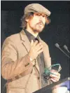  ?? TARA BRADBURY/THE TELEGRAM ?? Triple Musicnl Award winner Steve Maloney accepts the award for Country Artist of the Year during the gala at the St. John’s Convention Centre Sunday night.