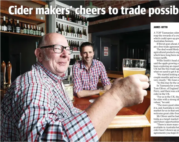  ?? Picture: LUKE BOWDEN ?? TOASTING THE FUTURE: Donning the apparent uniform of cider makers worldwide are UK cider maker Tom Oliver, left, and Willie Smith's cider maker Tim Jones.