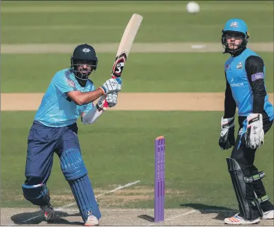  ?? PICTURE: ALEX WHITEHEAD/SWPIX.COM ?? CENTURION: Yorkshire’s Cheteshwar Pujara strikes the ball on his way to 101 against Worcesters­hire.