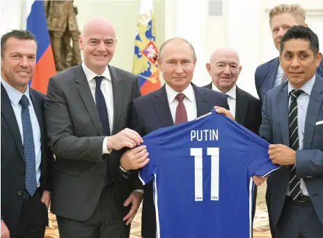  ?? AFP ?? Former German captain Lothar Matthaus, Fifa president Gianni Infantino, Russian president Vladimir Putin, first vice-president of the Russian Football Union Nikita Simonyan and Mexico’s former internatio­nal Jorge Campos pose during a meeting with world...