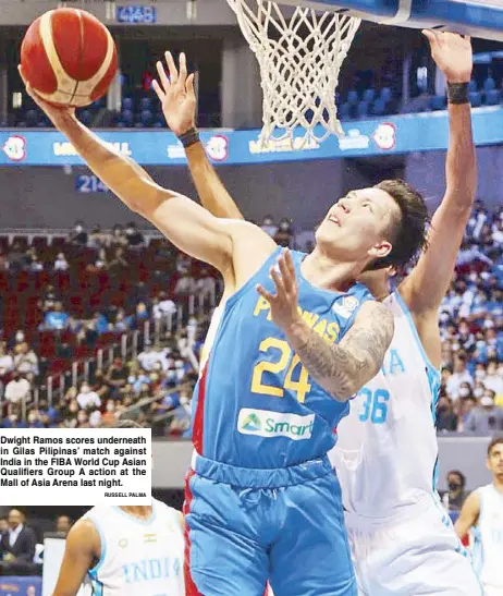  ?? RUSSELL PALMA ?? Dwight Ramos scores underneath in Gilas Pilipinas’ match against India in the FIBA World Cup Asian Qualifiers Group A action at the Mall of Asia Arena last night.