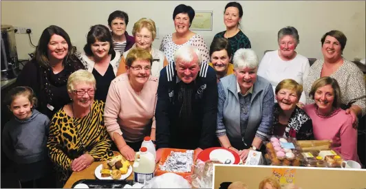  ??  ?? ABOVE: Fr Eamon Mulvihill with the caterers and helpers at his farewell party.