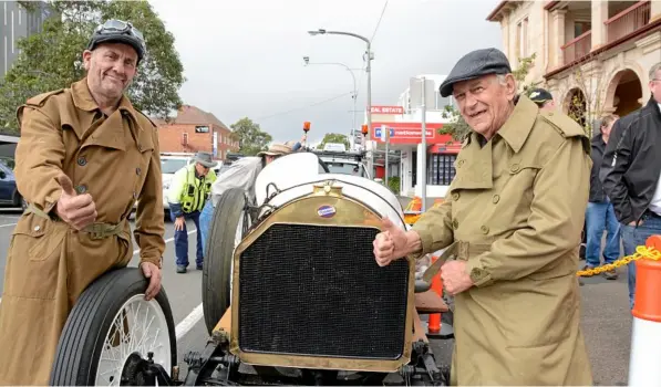 ?? Photo: Tom Gillespie ?? VINTAGE: Paul Adams (left) and owner Graham Crittenden with his 1912 Willys-Overland, which yesterday marked 100 years since Fred Eager drove it from Brisbane to Toowoomba.