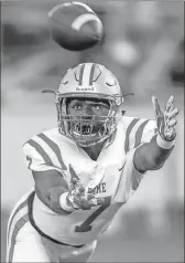  ?? / Cecil Copeland, MDJ ?? Rome’s Xavier Roberts-Donaldson dives for a reception during a Region 7-5A game at Kell on Friday.