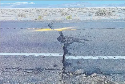  ?? Esmeralda County Sheriff ’s Office ?? Road separation is evident on U.S. Highway 95 near Coaldale. The highway was closed until crews placed patches.