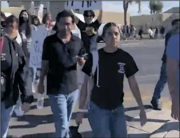  ?? COURTESY PHOTO ?? This video capture shows Calexico City Council Member Raul Ureña (front, second from left) leading Calexico High School students in a protest march on Thursday.