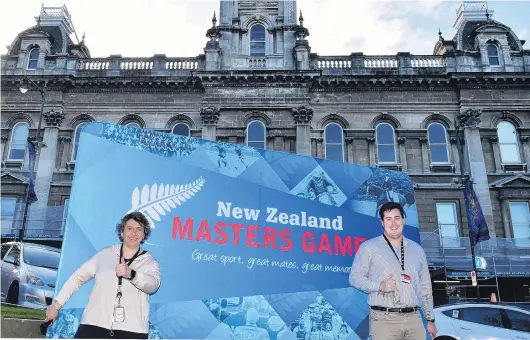  ?? PHOTO: GREGOR RICHARDSON ?? Thumbs up . . . Masters Games organisers Vicki Kestila and Ben Anngow in the Octagon yesterday as they celebrate the launch of the 2022 Games.