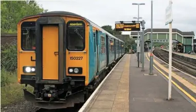  ?? ALAMY. ?? Arriva Trains Wales 150227 stands at Bridgend on June 29. Electrific­ation will now only stretch as far as Cardiff, and not to Bridgend and further west to Swansea.