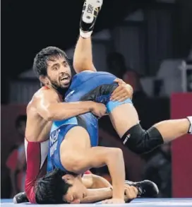  ?? INASGOC ?? Even after his Asian Games triumph, Bajrang Punia is still wrestling for recognitio­n.