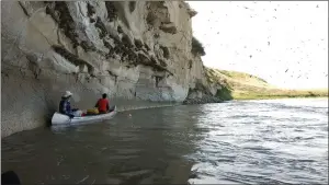  ?? SUBMITTED PHOTO KRIS SAMRAJ ?? Glen and Keith Leavitt watch cliff swallows.