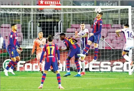  ?? AFP ?? Barcelona’s defender Clement Lenglet heads the ball during a match against Real Valladolid on Monday.