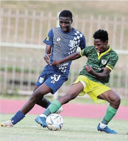  ?? /GALLO IMAGES /PHILIP MAETA ?? Tshepo Mashigo of Magesi and Boy Madingwana of Baroka during the Motsepe Foundation Championsh­ip match at Old Peter Mokaba Stadium in Polokwane.