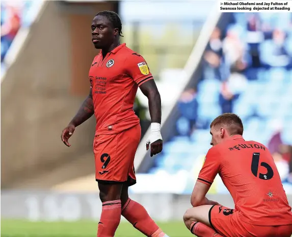  ?? ?? > Michael Obafemi and Jay Fulton of Swansea looking dejected at Reading