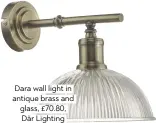  ??  ?? Dara wall light in antique brass and glass, £70.80, Där Lighting