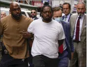  ?? MARY ALTAFFER — THE ASSOCIATED PRESS ?? Subway shooting suspect Andrew Abdullah is escorted into the Fifth Precinct on Tuesday in New York.