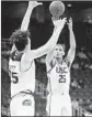  ?? Charlie Riedel Associated Press ?? BENNIE Boatwright, right, found his shooting eye for USC at the NABC Hall of Fame Classic.