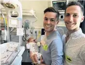  ?? COURTESY PHOTO ?? Matt, left, and Andrew, a couple from Washington, D.C., will celebrate Father’s Day at Winnie Palmer Hospital with their baby girl Carey Hill, who was born 16 weeks early.