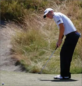  ??  ?? Tom Hoge putts on the 10th hole during a practice round for the U.S. Open at Chambers Bay on Wednesday, June 17, 2015 in University Place, Wash.