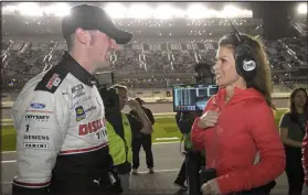  ?? Phelan M. Ebenhack
The Associated Press ?? Reporter Jamie Little interviews driver Austin Cindric at Daytona Internatio­nal Speedway.