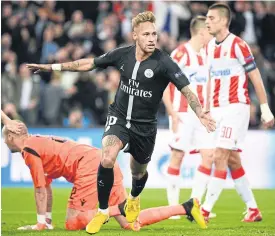  ??  ?? PSG’s Neymar celebrates after scoring against Red Star Belgrade.