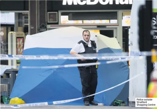  ??  ?? Police outside Stratford Shopping Centre