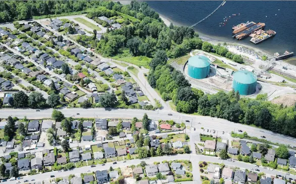  ?? JONATHAN HAYWARD/THE CANADIAN PRESS ?? The National Energy Board says work can go ahead at the Westridge Marine Terminal, which will undergo an expansion, as well as at the nearby tunnel portal site and at staging areas. However the NEB says no other sections of the Trans Mountain pipeline...