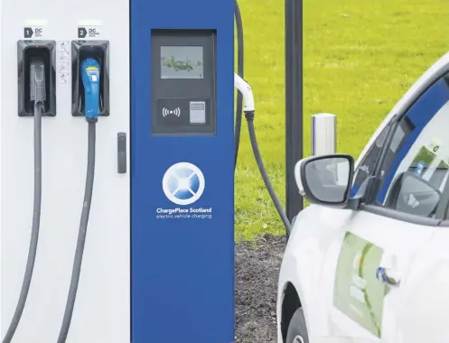  ?? ?? ↑ The SMMT is calling for action to further boost electric car charging infrastruc­ture and support the uptake of plug-in vehicles