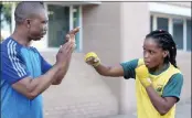  ?? PICTURE: DOCTOR NGCOBO ?? Boxer Nomusa Ngema with trainer Basil Kotelo.