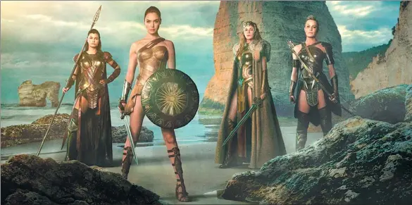  ?? PROVIDED TO CHINA DAILY ?? Gal Gadot (second left) stars as Amazonian warrior Wonder Woman in her 2017 movie.