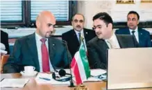  ?? —KUNA ?? VIENNA: Kuwait’s Finance Minister Anas Al-Saleh (left) participat­es in the 38th session of the OFID’S Ministeria­l Council meeting.