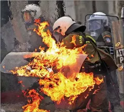  ??  ?? IS THIS WHAT WE WANT?: Molotov cocktails exploding in Athens