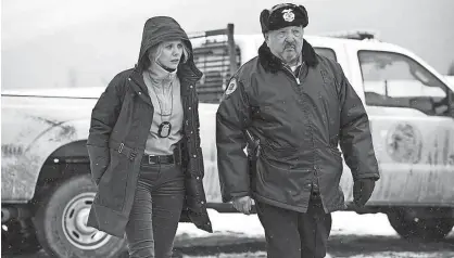  ?? PHOTOS COURTESY OF THE WEINSTEIN COMPANY ?? Elizabeth Olsen and Graham Green in a scene from “Wind River.”