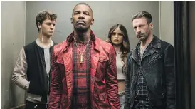  ?? TRISTAR ?? Jamie Foxx, second from left, and Company in the movie Baby Driver.